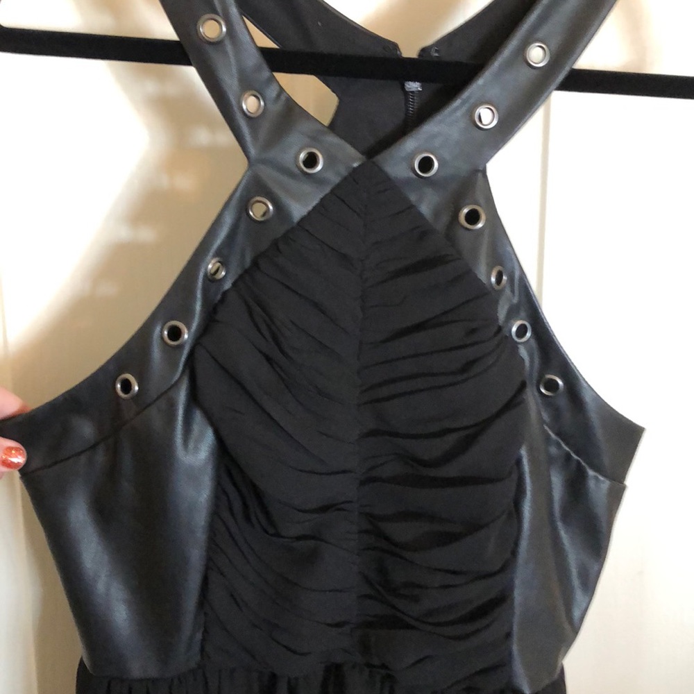 New with tags beautiful dress w/ a bit of edgy.
